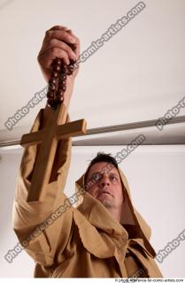 28 2018 01 JOEL ADAMSON MONK WITH CRUCIFIX